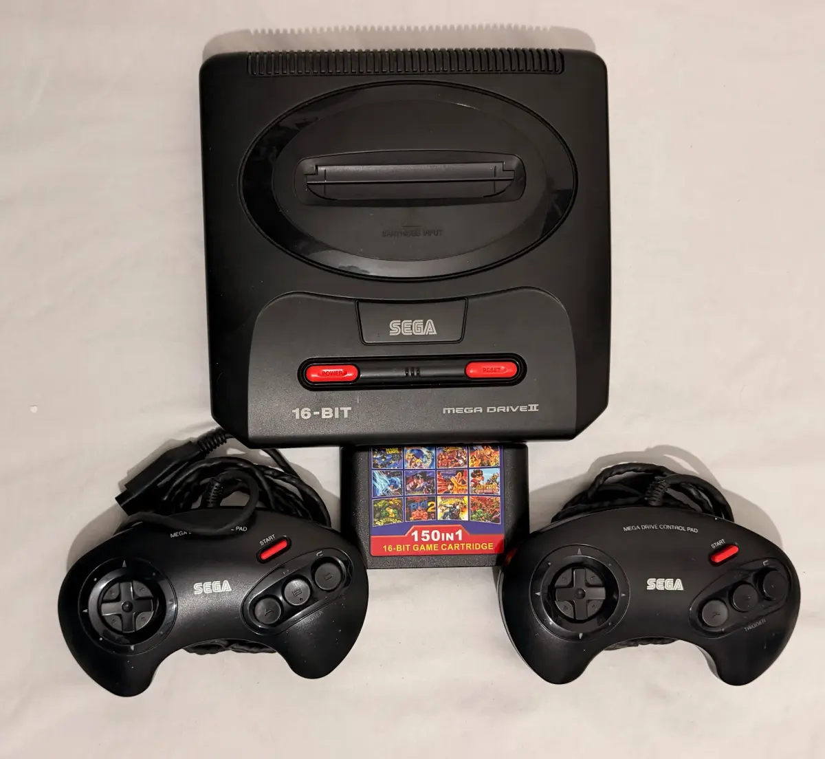 SEGA Mega Drive II מקורי באריזה – 2 שלטים, מחסנית 150-in-1 וניירת מקורית 3