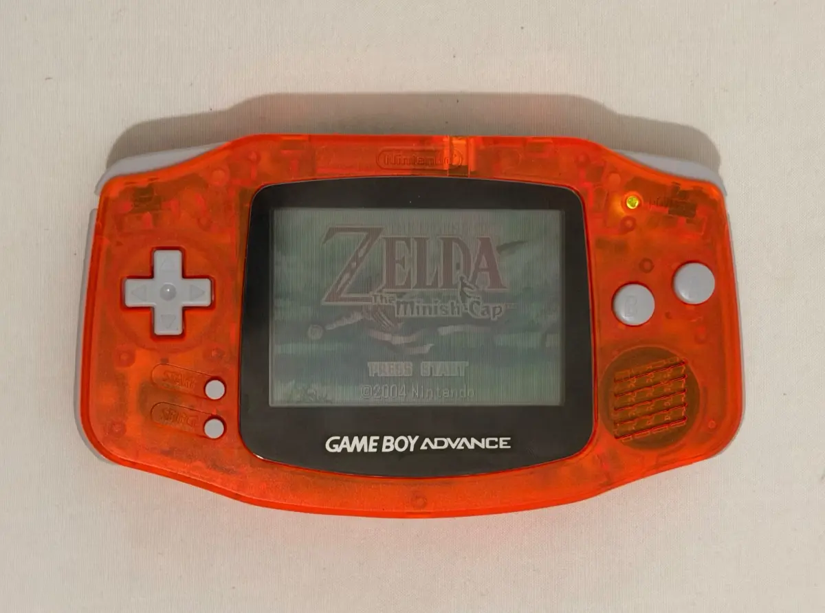 Nintendo Game Boy Advance כתום שקוף + Zelda The Minish Cap