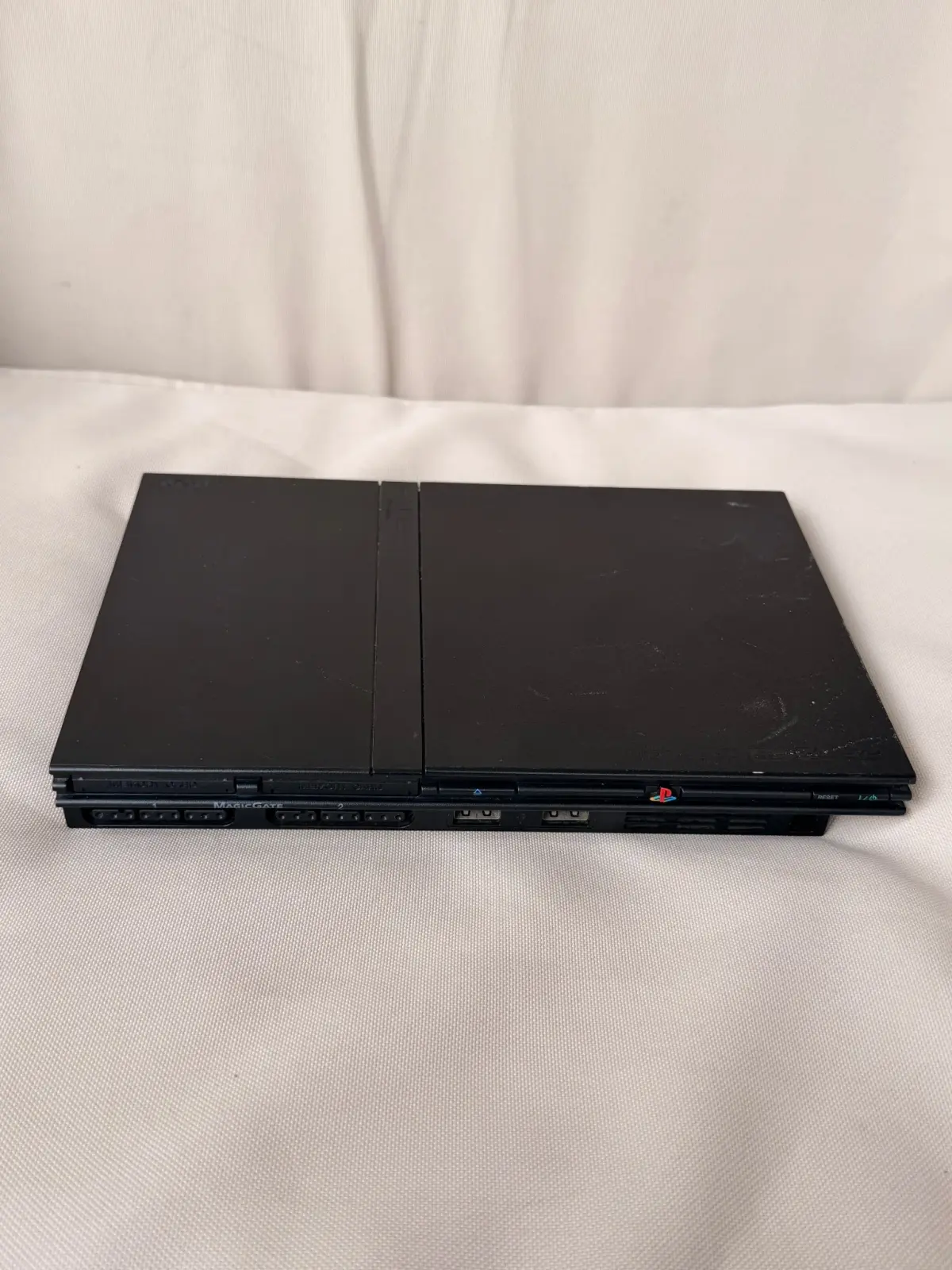 Sony PlayStation 2 Slim SCPH-77006 – קונסולת רטרו שחורה